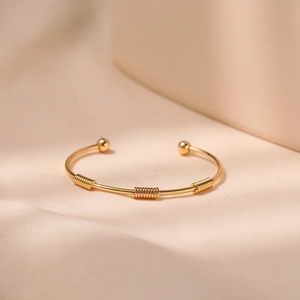 18K gold plated brass open bangle with spiral design and decorative beads for women