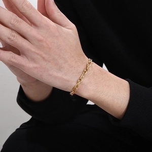 Chic gold-plated stainless steel link bracelet shown on a female wrist for a stylish look