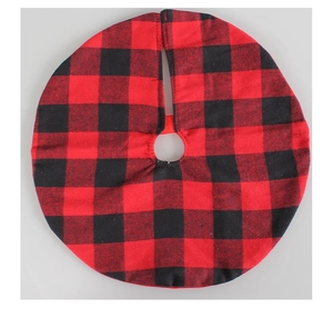 Detailed macro view of classic red and black buffalo check Christmas tree skirt textures