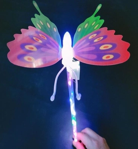 Close-up of a glowing butterfly fairy wand with colorful LED lights and transparent handle