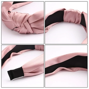 Pink vintage satin headband with twisted knot design and non-slip lining for women