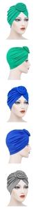 Detail of green, royal blue, and grey turban hats for women with floral rose knot design