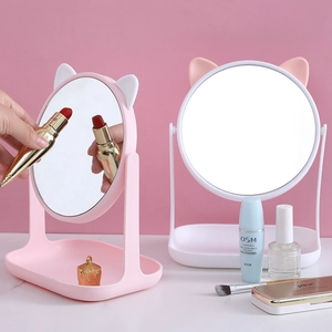 Cute cat-ear desktop makeup mirror with storage base and 360-degree rotation feature