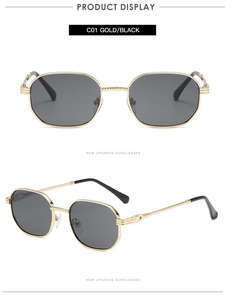 Detail of gold metal sunglasses with spiral texture temples and octagonal black lenses