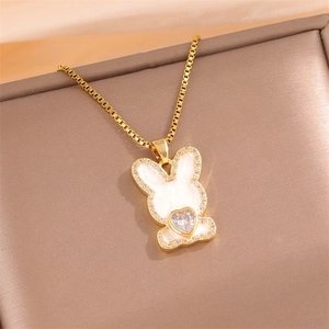 Gold plated rabbit pendant necklace with white enamel and sparkling heart gemstone