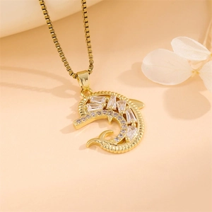 Golden dolphin pendant necklace with zircon crystals on a delicate box chain for women