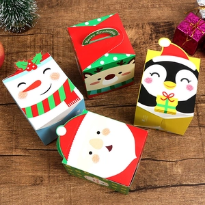 Set of four colorful Christmas Eve gift boxes featuring Santa, reindeer, and snowman