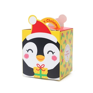 Yellow Christmas apple gift box with cute penguin pattern and red hat design in 45-degree view