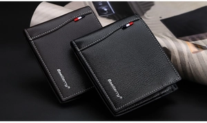 Detail of slim men's leather wallets in black and brown with textured finish and stitching