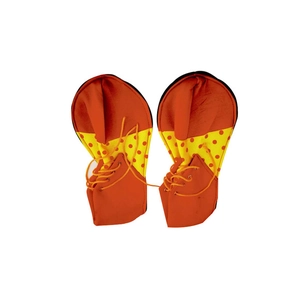 Detail view of orange circus clown shoe covers with yellow and red polka dot accents