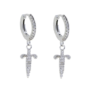 Detail shot of silver sword earrings with shimmering white zircon stones for men