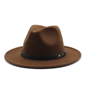 Detail of dark brown wool fedora hat featuring a black leather belt with gold studs