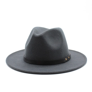 Detailed macro view of dark grey wool fedora hat with black leather strap and gold rivets