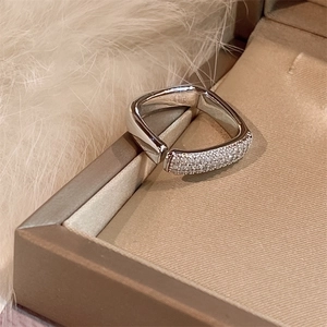 Elegant silver square open ring with micro-pave crystals in a premium beige jewelry box