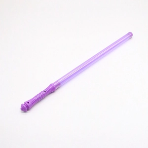 Macro shot of 48cm purple LED glow stick with textured handle for concert events