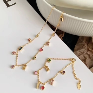 Sparkling multi-color zircon tassel necklace and bracelet set plated in 18K gold