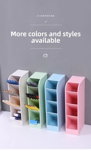 Macro view of multi-color slanted plastic desk organizers for stationery and makeup pens