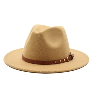 Detail of khaki wool fedora hat with brown leather band and gold rivet accents