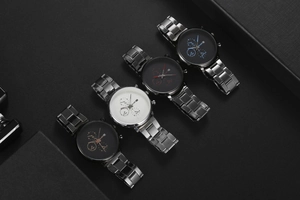 Detail shot of men's quartz watches with multi-dial design in black and silver finishes
