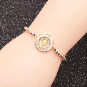 Three-tone beaded bracelet featuring a Virgin Mary medallion with zircon stones