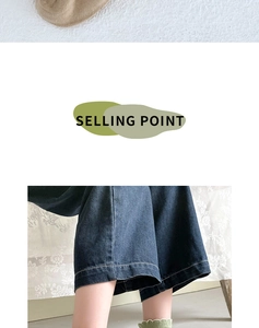 Detail of green lettuce edge cotton socks paired with dark blue denim fabric texture