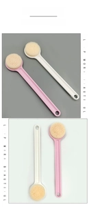 Close-up of long handle bath brushes in pink and white with soft bristles and hanging hole