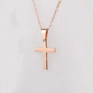 Polished rose gold cross pendant necklace with a sleek minimalist chain for couples