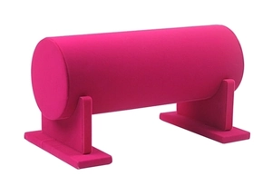 Detail view of pink velvet single tier cylinder headband and bracelet display stand