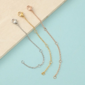 Adjustable stainless steel extension chains in silver, gold, and rose gold with lobster clasps
