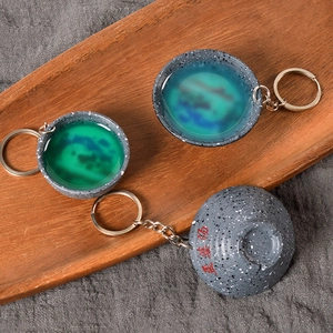 Creative Jian Zhan tea cup keychain with grey spotted glaze and colorful kiln transformation
