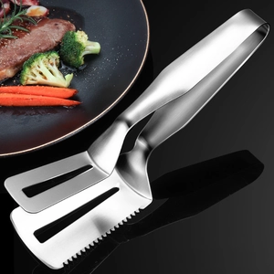 Detailed macro view of 304 stainless steel food tongs with serrated edges and brushed finish