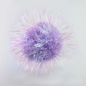 Macro detail of a 6cm purple crinkle glitter ball toy with shiny reflective fibers