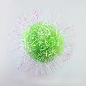 Macro detail of 6cm crinkle paper cat toy ball with green core and glossy pink tinsel