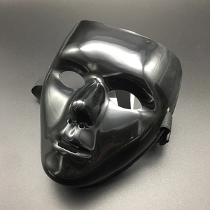 Detail of a shiny black full face hip-hop mask with elastic strap for Halloween parties