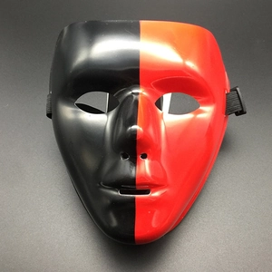 Detailed view of bicolor black and red glossy mask with elastic band for Halloween costume