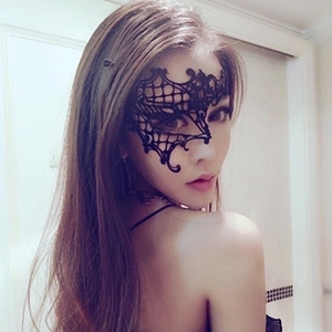 Elegant black lace masquerade eye mask for women featuring intricate floral cutouts