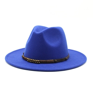 Detail of navy wool fedora with brown leather rivet band and flat wide brim