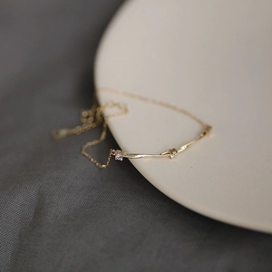 Minimalist S925 sterling silver Mobius bracelet with 14K gold plating and pavé diamonds