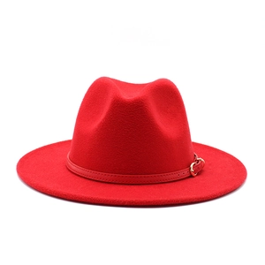 Classic red wool fedora hat with wide brim and leather band with gold metal buckle