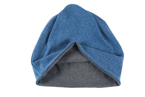 Close-up of double-layer knit beanie showing dark blue outer and grey inner textures