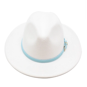 Detail of white wide brim wool fedora with light blue leather band and gold buckle