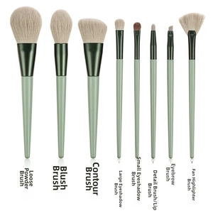 Detail view of 8 professional makeup brushes including powder, blush and eyeshadow tools