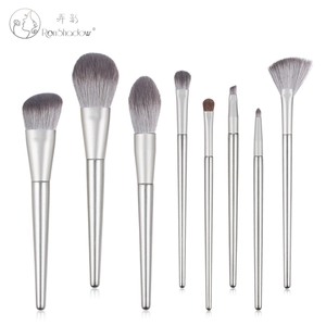 Detailed set of 8 silver makeup brushes with soft bristles for face and eyes
