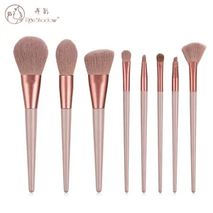 Close-up of 8-piece makeup brush set with Morandi pink handles and rose gold ferrules