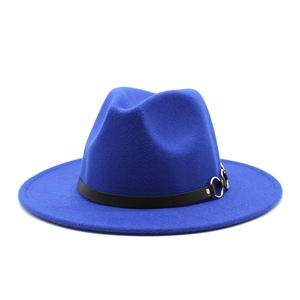 Close-up of royal blue wool fedora featuring a black leather band and silver metal ring