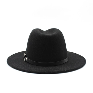 Close-up of black felt fedora hat featuring a thin leather band and silver buckle detail