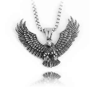 Vintage stainless steel eagle pendant with detailed wings on square chain with reflection