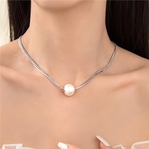 Elegant double-layered silver snake chain necklace with a large round white pearl pendant