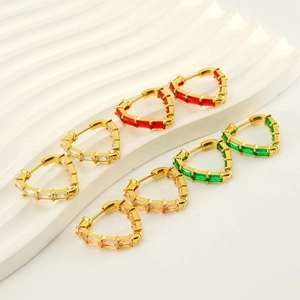 Detail view of 18k gold plated heart earrings with colorful rectangular gemstones