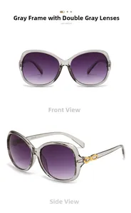 Detail of grey oval sunglasses featuring purple gradient lenses and gold bow decoration